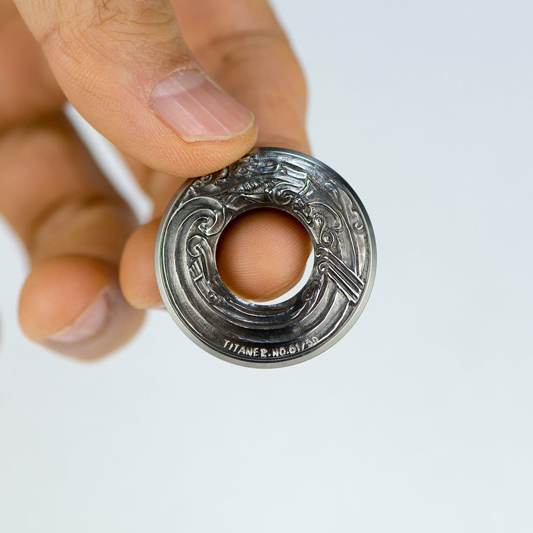 Tiroler: Exquisite Titanium Curve Measure Ring on Fingertips