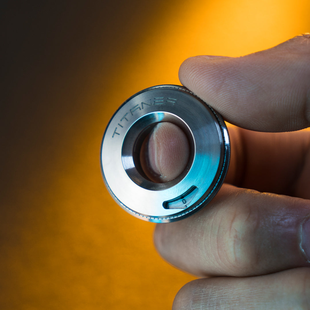 Tiroler: Exquisite Titanium Curve Measure Ring on Fingertips